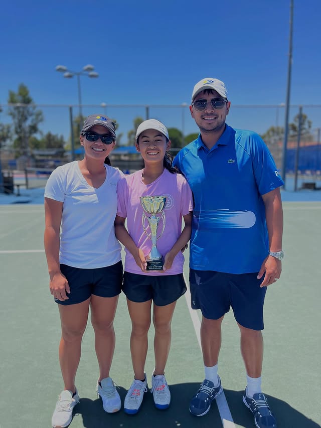 Trophy celebration with coach